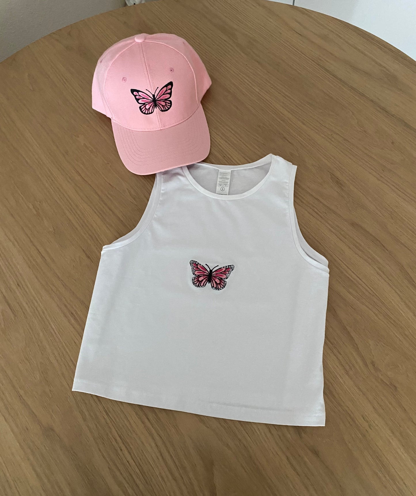 CONJUNTO TOP Y GORRO/A MARIPOSA